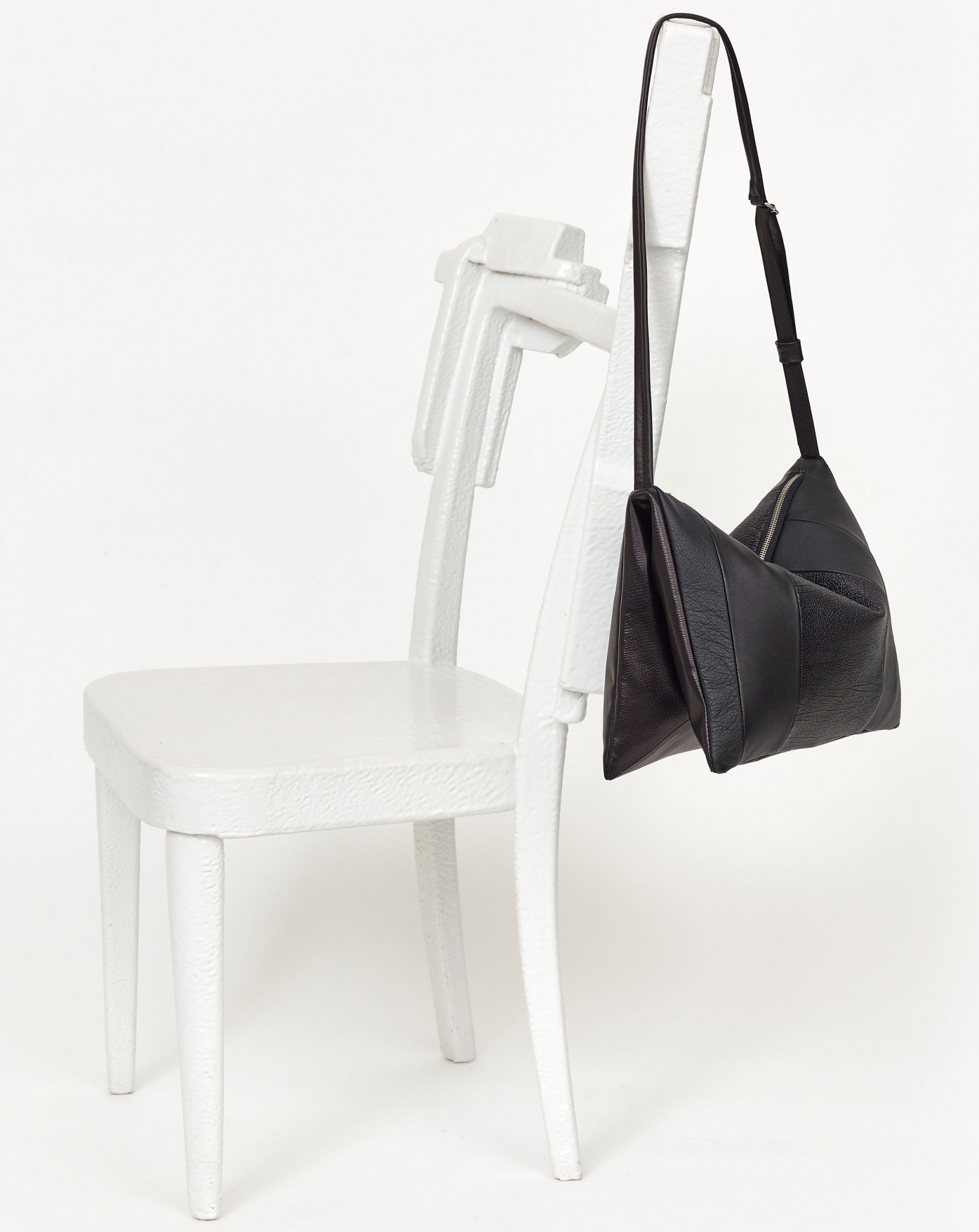 Medium shoulder bag with two main compartments shades of black EVA BLUT